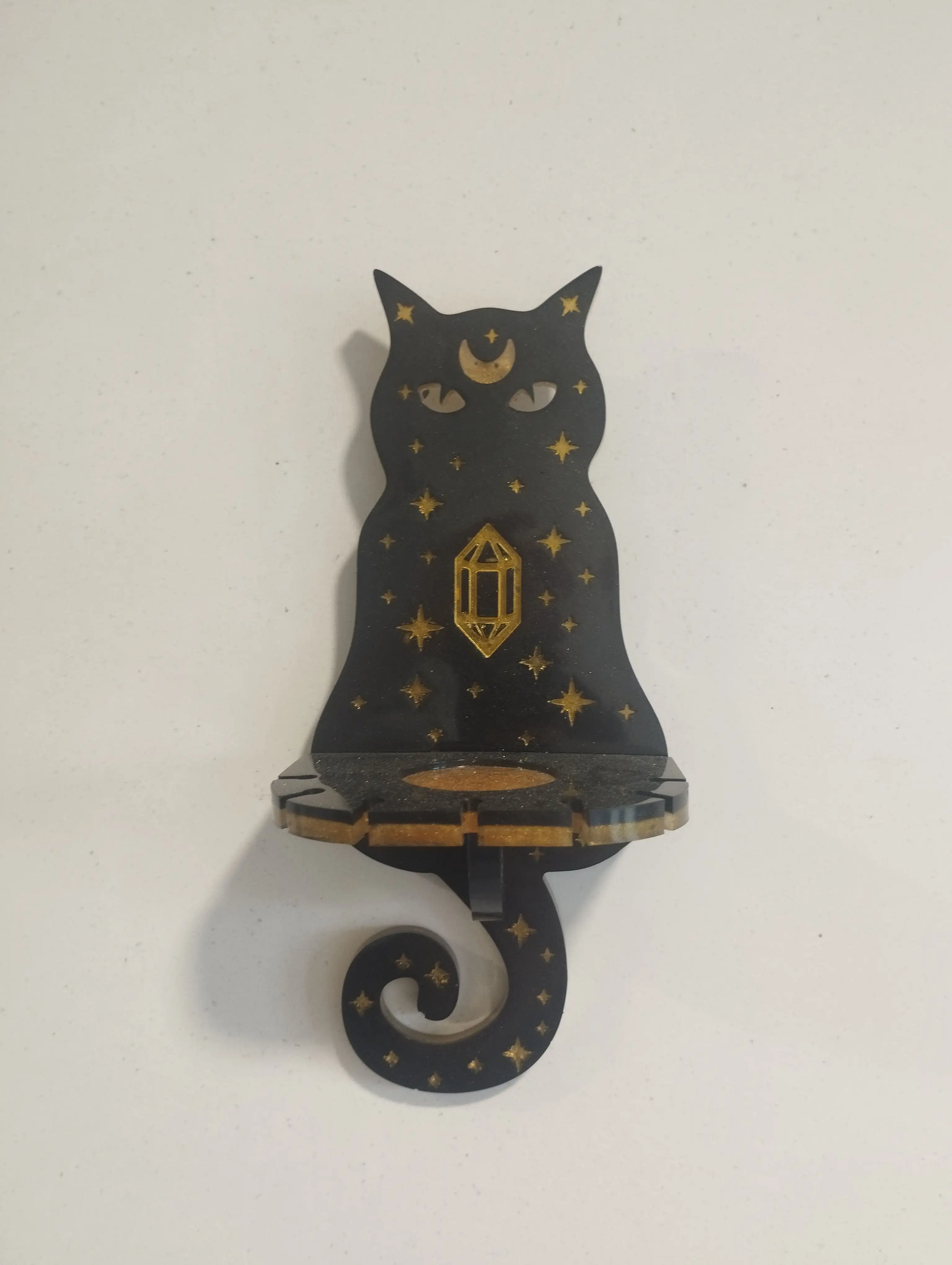 Gato portavelas