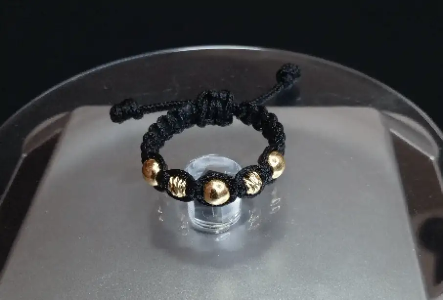 Anillo tejido en oro laminado18k