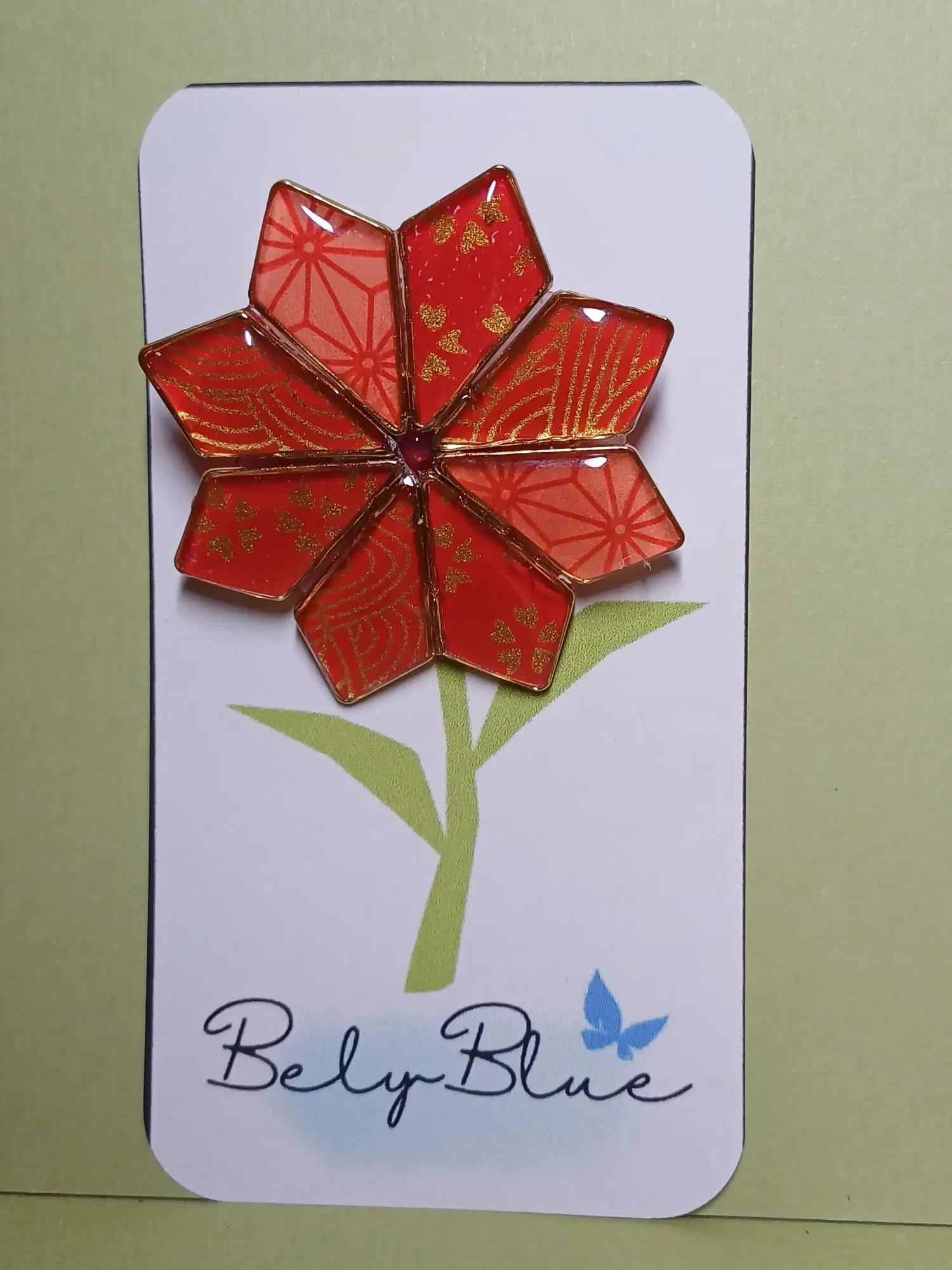 Broche flor dorado