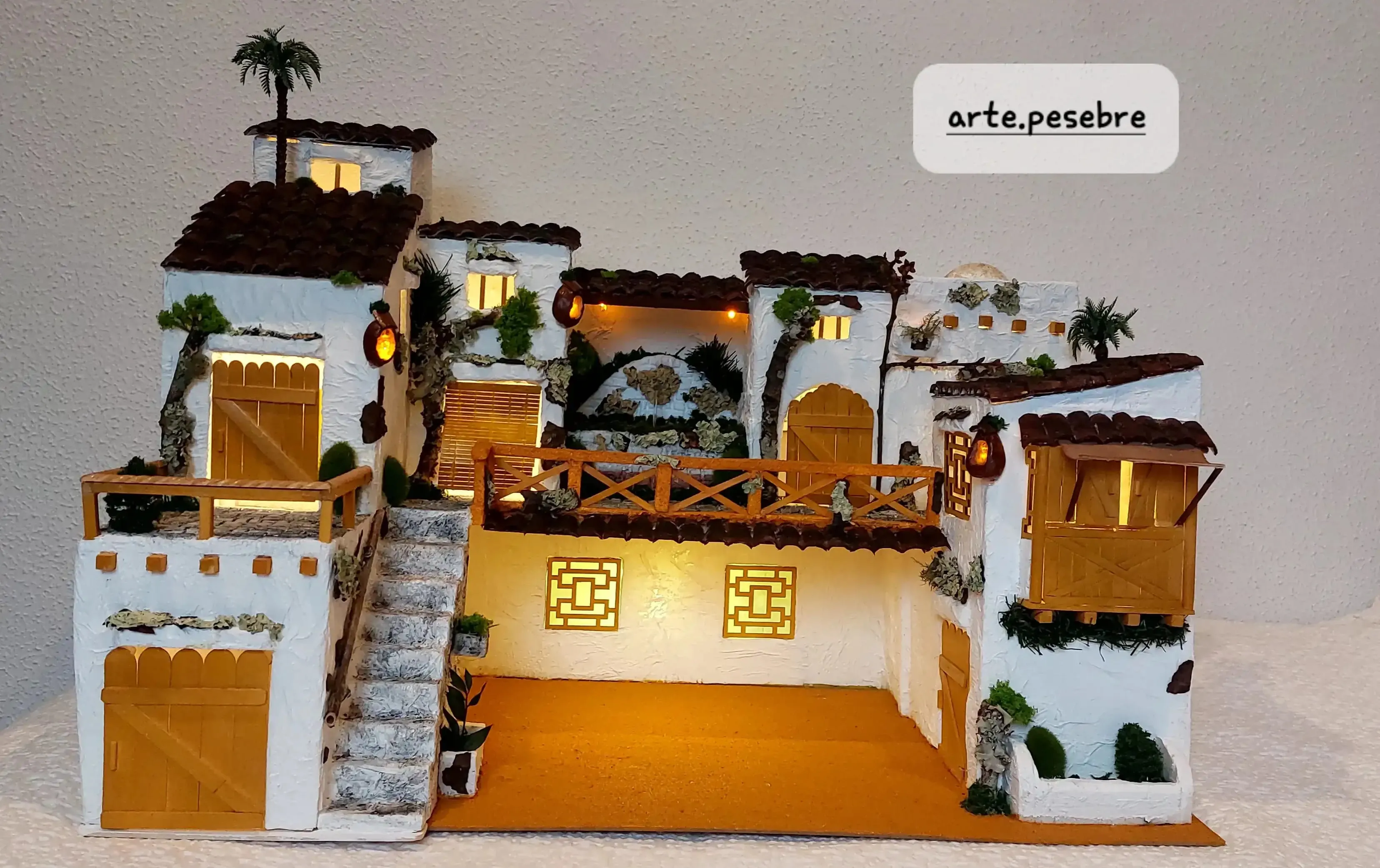 Pesebre con fuente con agua.