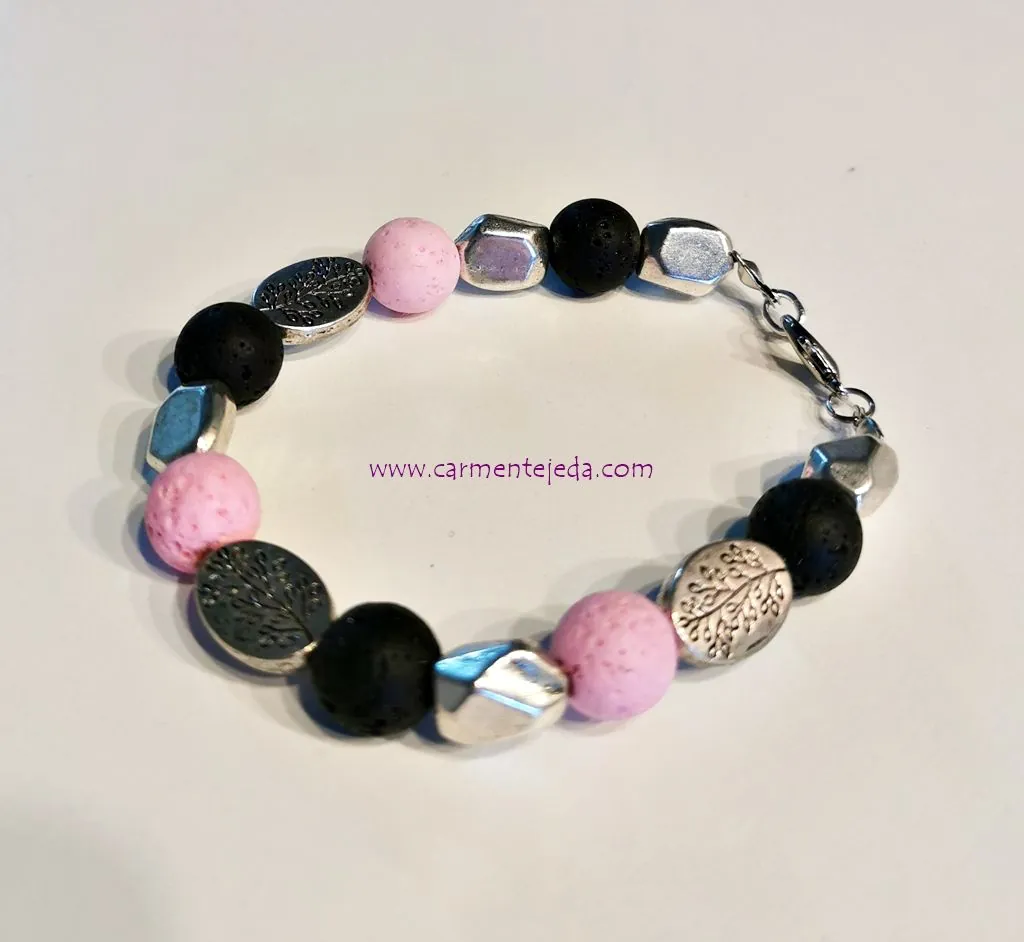 Pulsera de piedras de lava negra y rosa y zamak