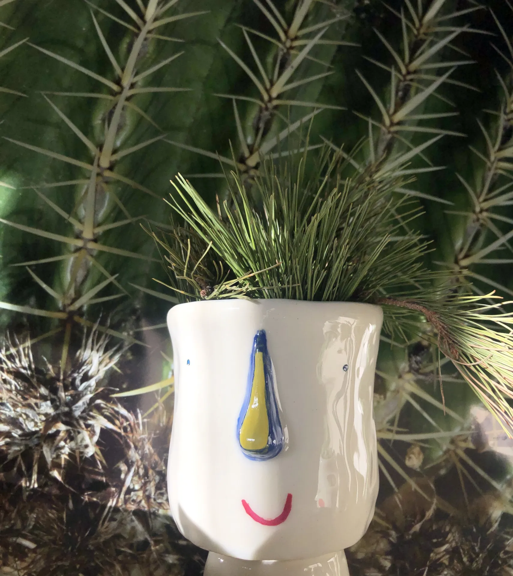 Maceta con carita 