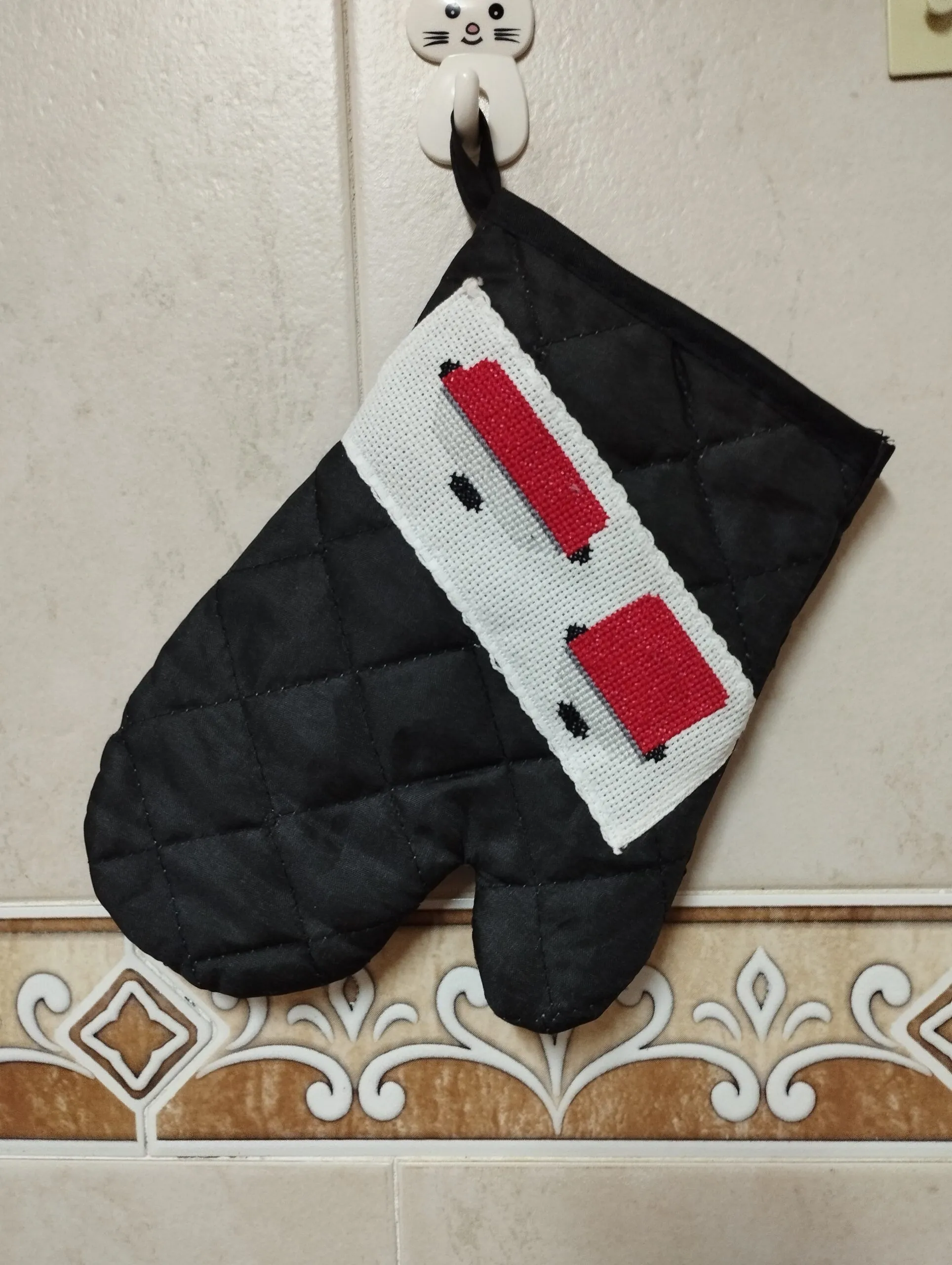Manopla y agarrador